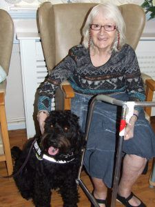 Residents enjoy a visit from Gracie Therapy dogs once a month.